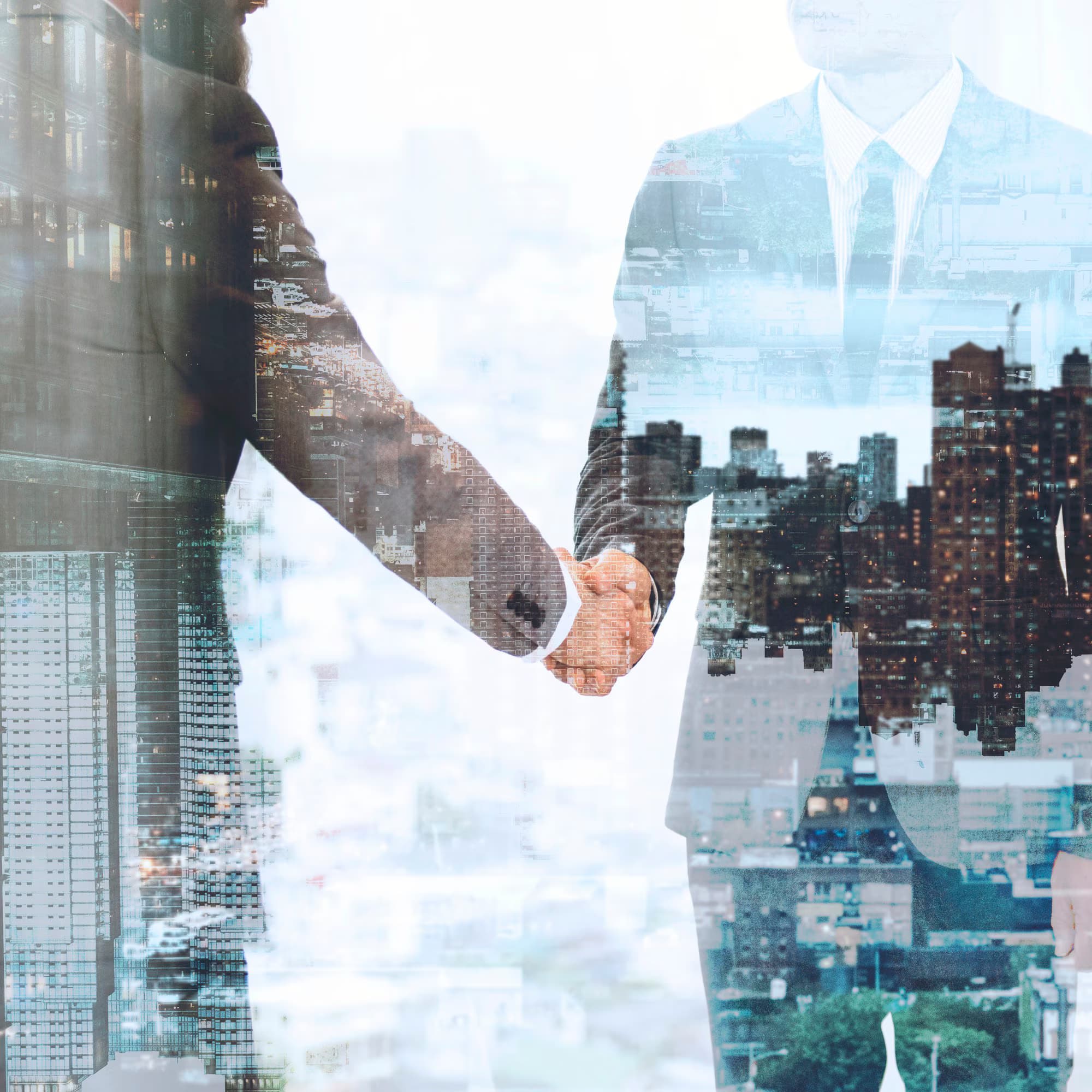 Business partners shaking hands