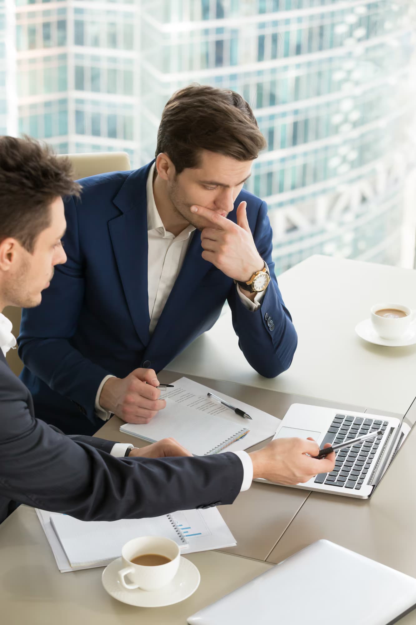 Colleagues discussing results in a meeting
